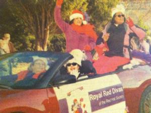 Royal Red Divas in the Youngsville Christmas Parade, 2012. Lorna Harris in back foreground, Monica Richardson i back waving Annie Holshouser driving, Helen Holshouser beside her in front.